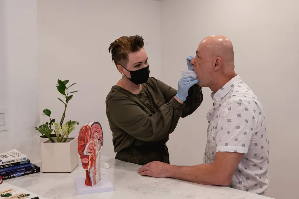 Julia working with a client during an assessment